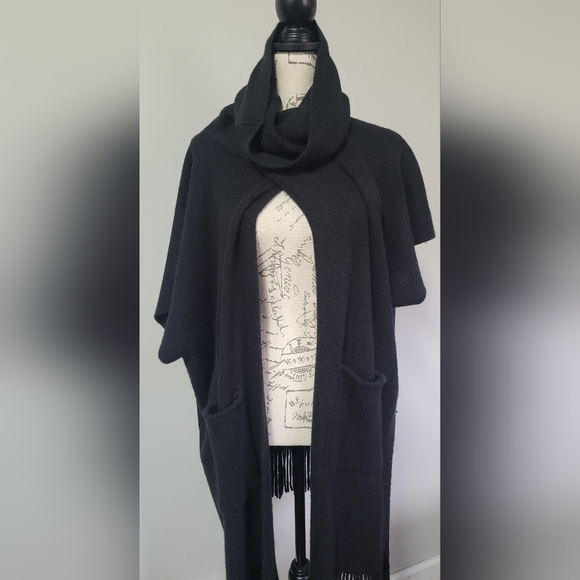 Black, turtleneck poncho with fringe at the bottom in OS. - Picture 3 of 8